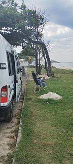 Estacionamento em Costanera em frente à praia
